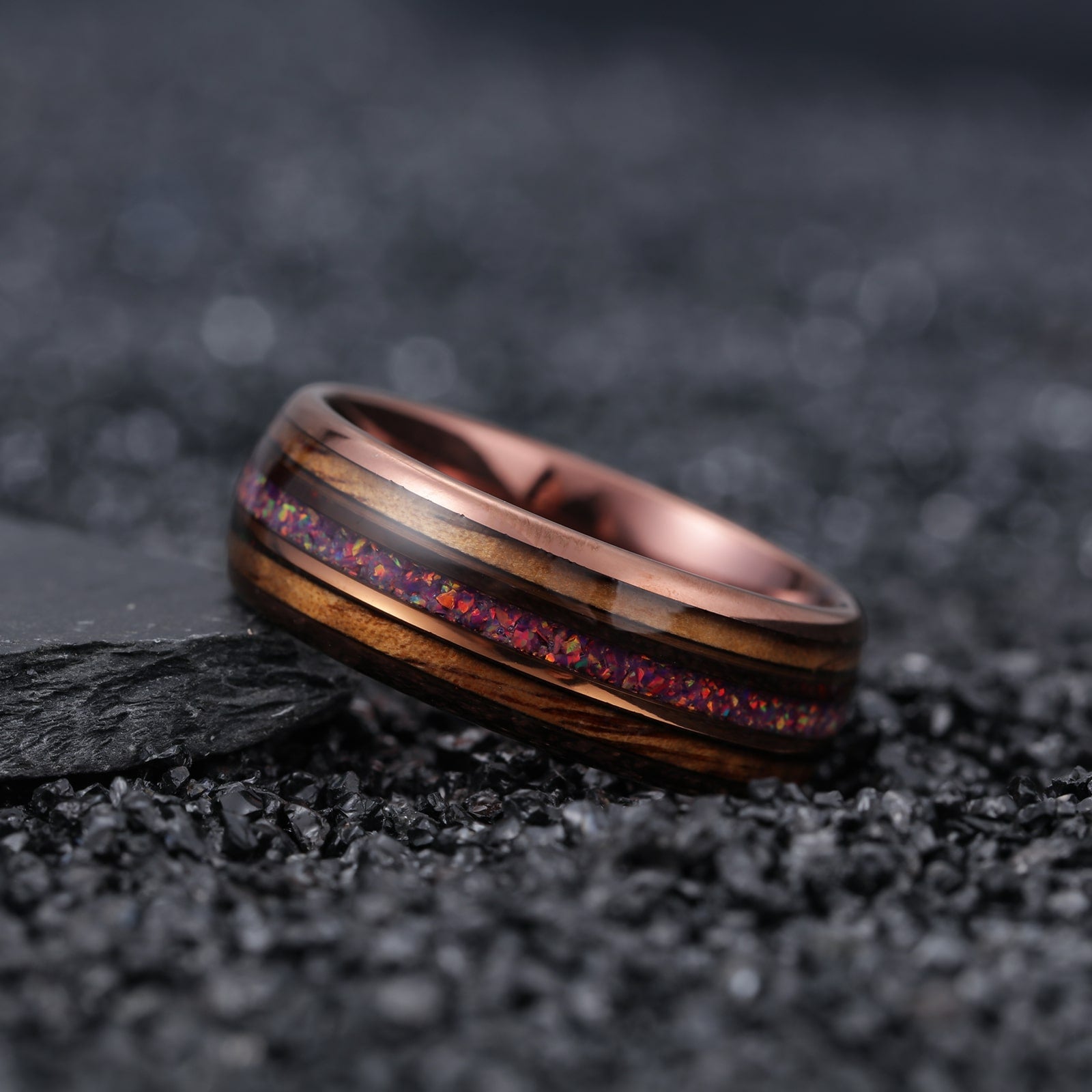 Opal Wooden Ring by Joycoast, laying on it's side
