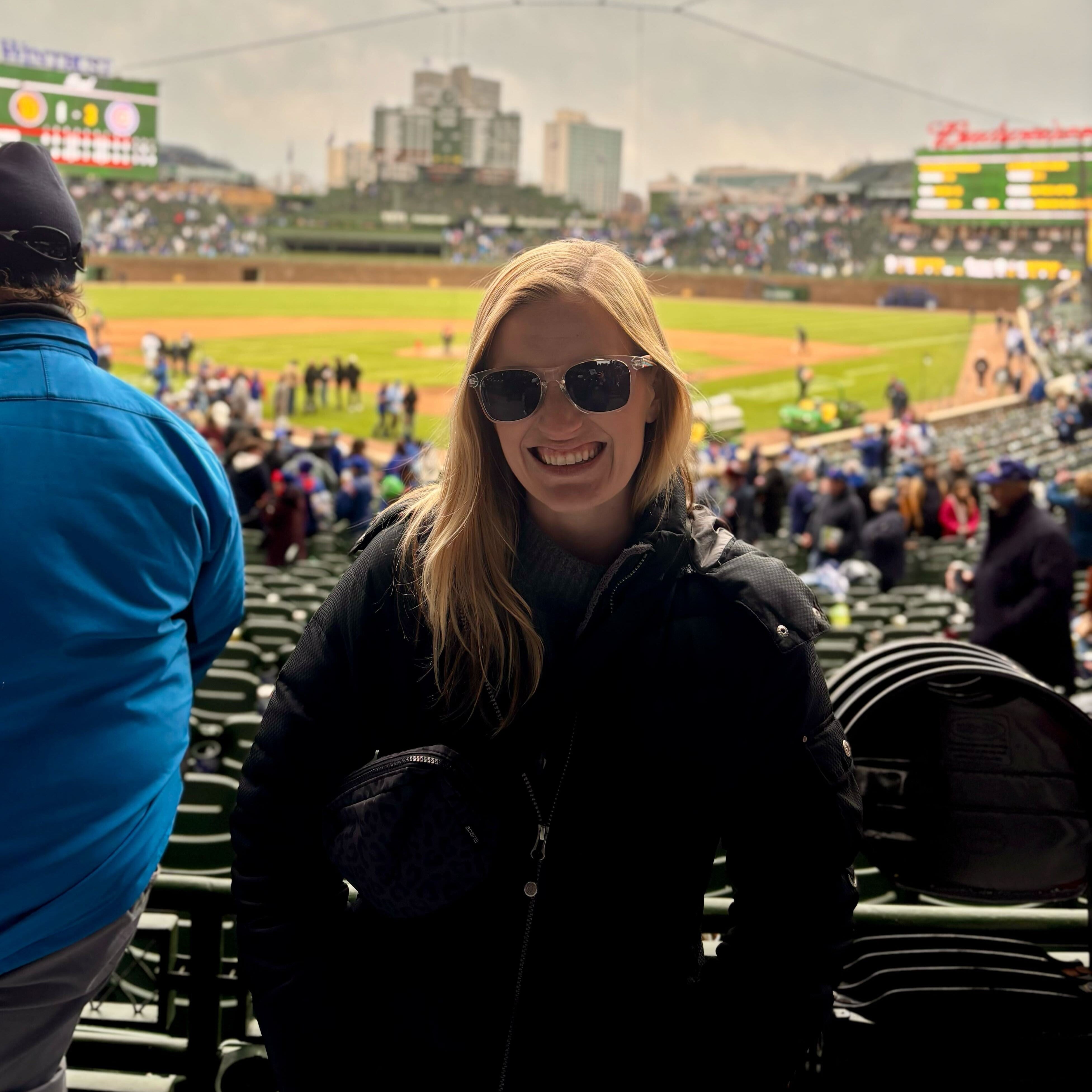 Girl Wearing Funky Wooden Sunglasses at Cubs Game at Wrigley Field in Chicago