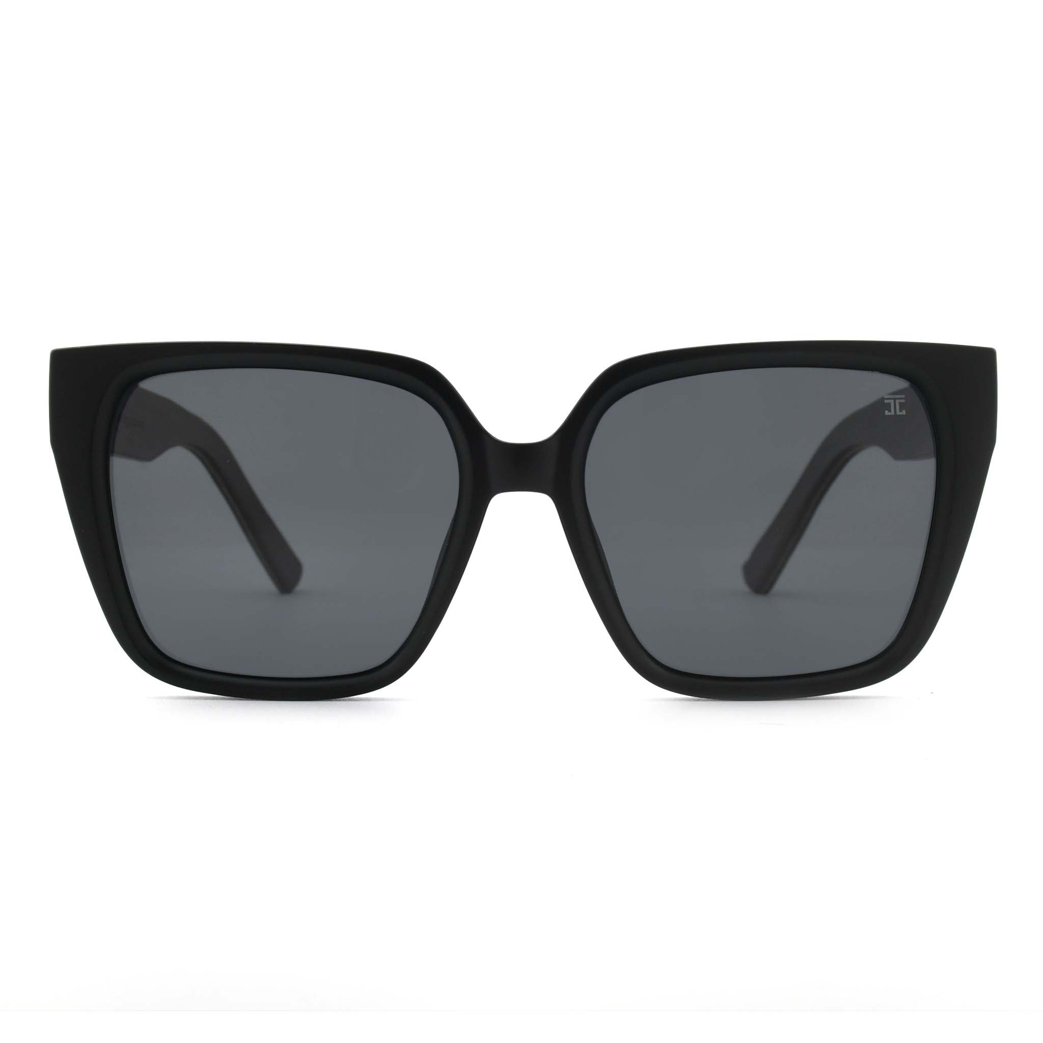 Joycoast black sunglasses with dark lenses and wooden arms, viewed from the front on a white background
