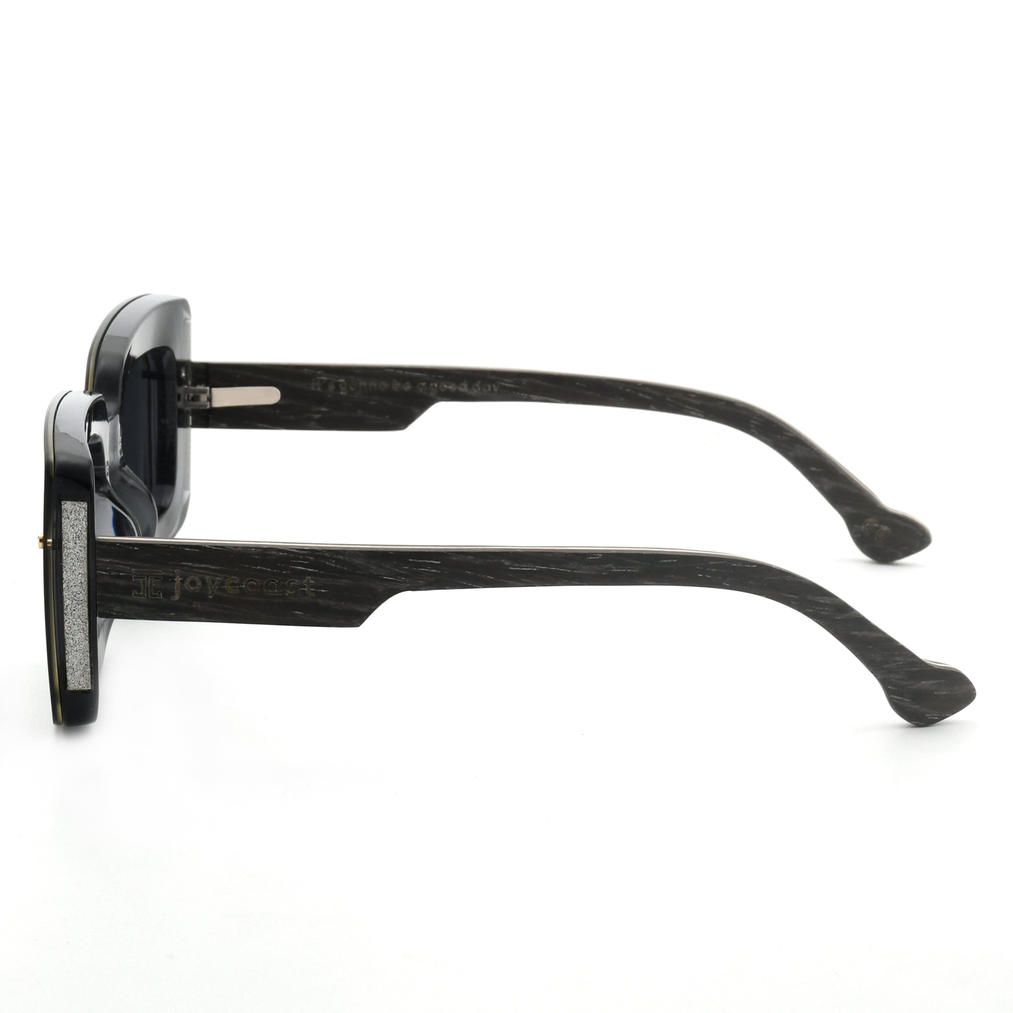 Joycoast black wooden square sunglasses with dark lenses, viewed from a top-down perspective on a white background.