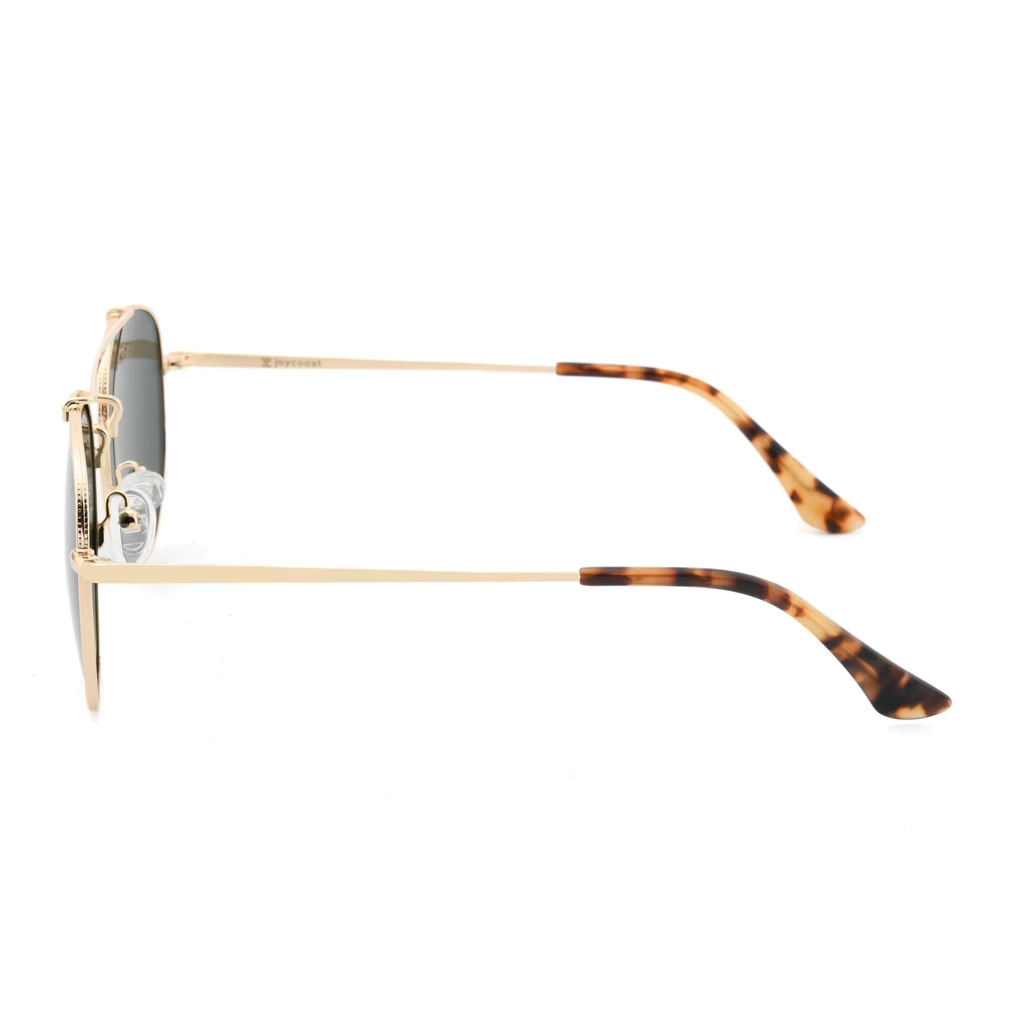 Joycoast Skyline gold metal sunglasses with dark green lenses and tortoise shell arms, viewed from the top down.