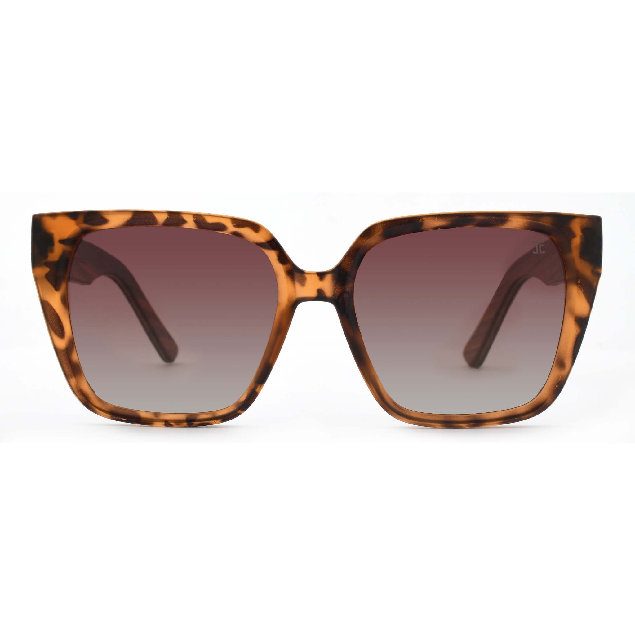 Joycoast tortoise shell sunglasses with brown gradient lenses and wooden arms, viewed from the front on a white background.