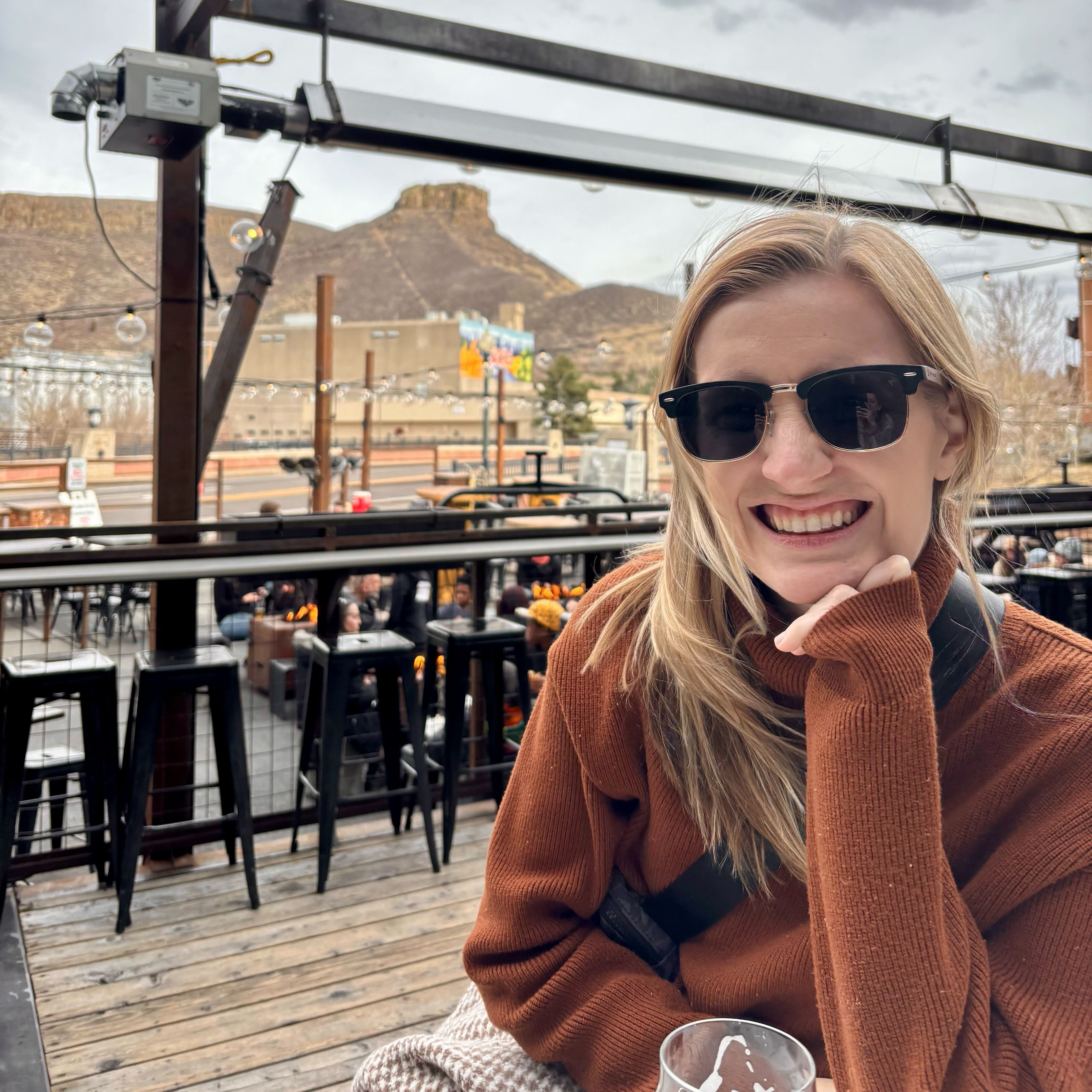 Clubmaster sunglasses with dark lenses and walnut temple arms