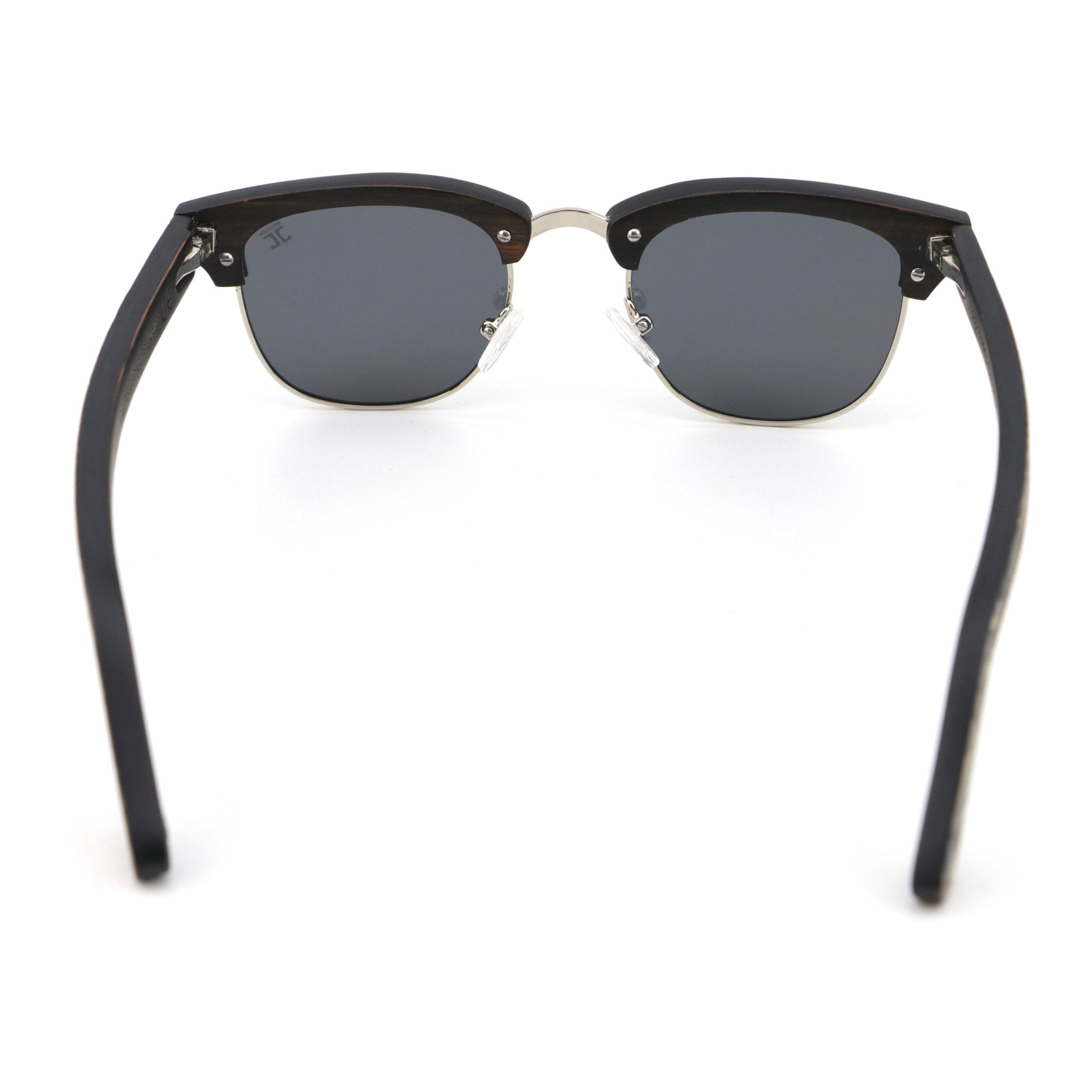 Polarized sunglasses with dark lenses and matte black temples on metal frame.