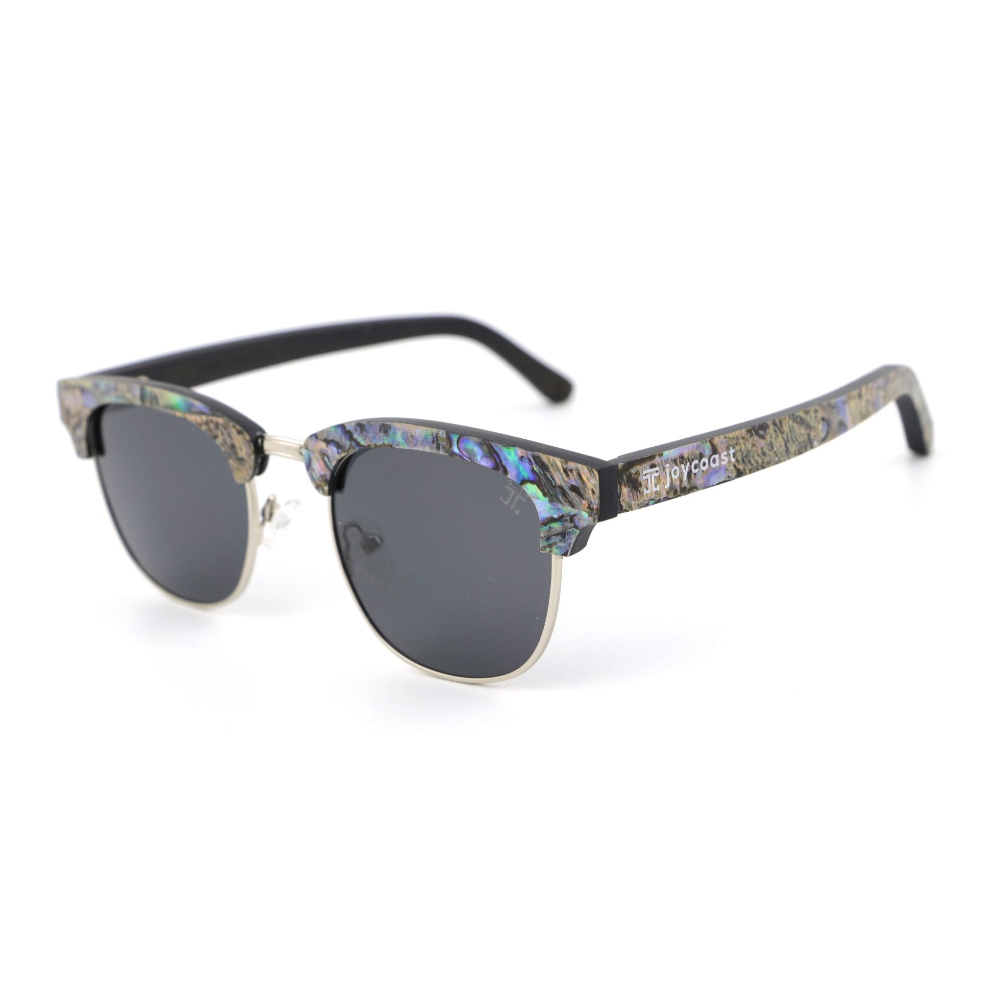 Polarized sunglasses with dark lenses and abalone-style multicolor temples on clear metal frame.