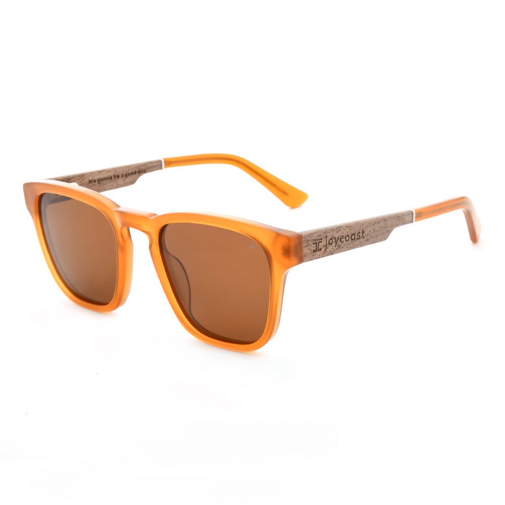 Orange acetate sunglasses with brown tinted lenses and wooden temple arms