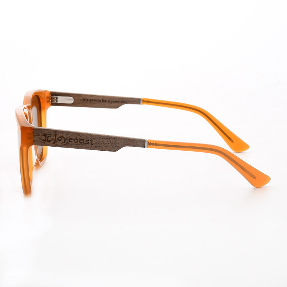 Side view orange sunglasses with brown lenses and wooden temple arms