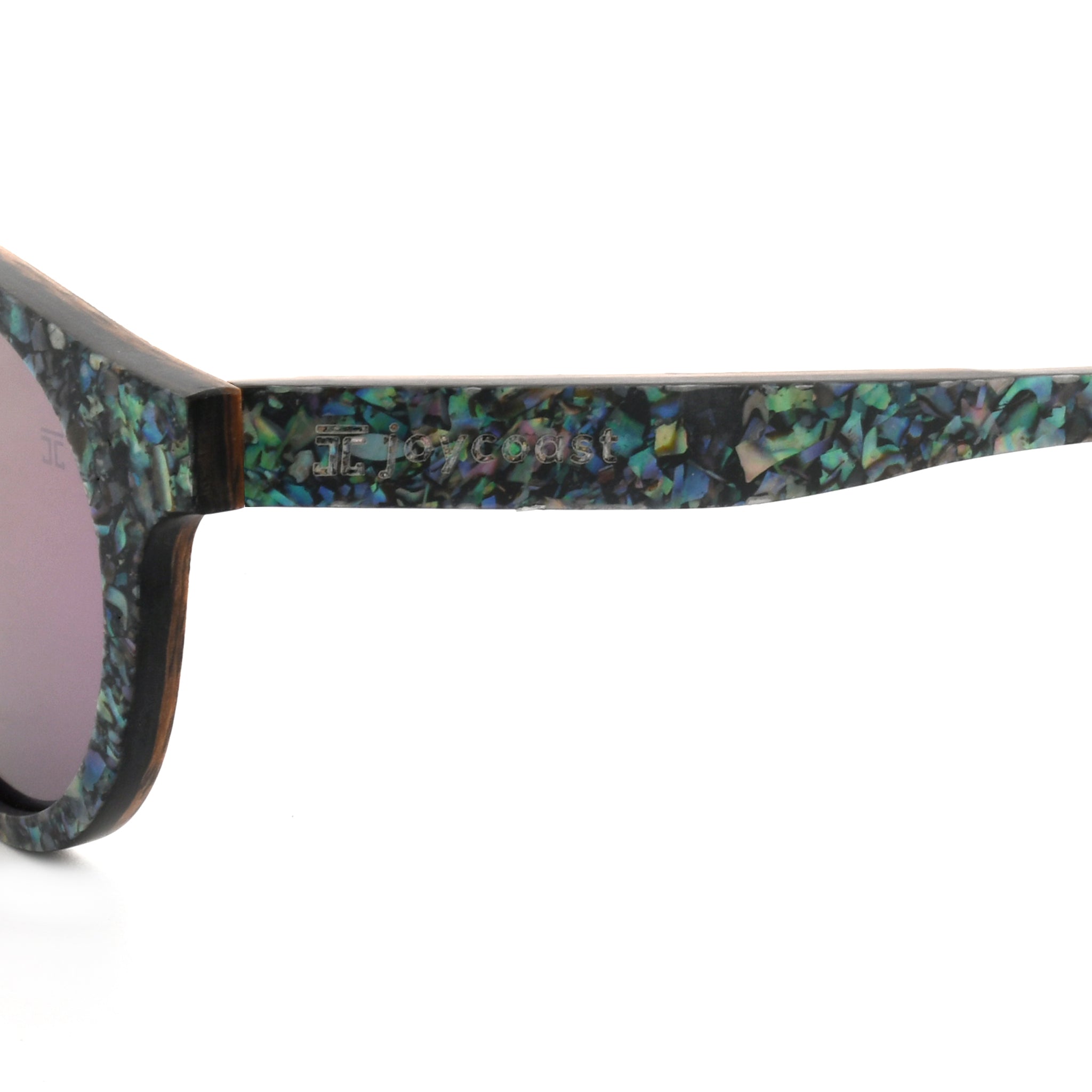Sunglasses arm close-up with abalone-pattern detailing, brown hinge and temple.