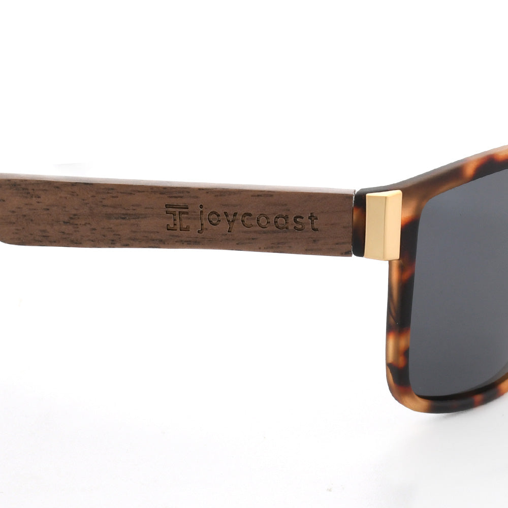 Tigers sunglasses arm detail with wood-look brown finish and tortoiseshell corner