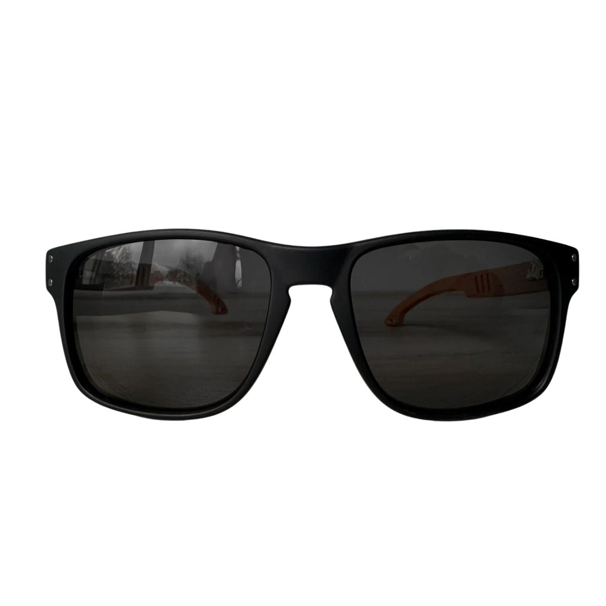 Sporty sunglasses with black frame, dark lenses, and wood temple accents