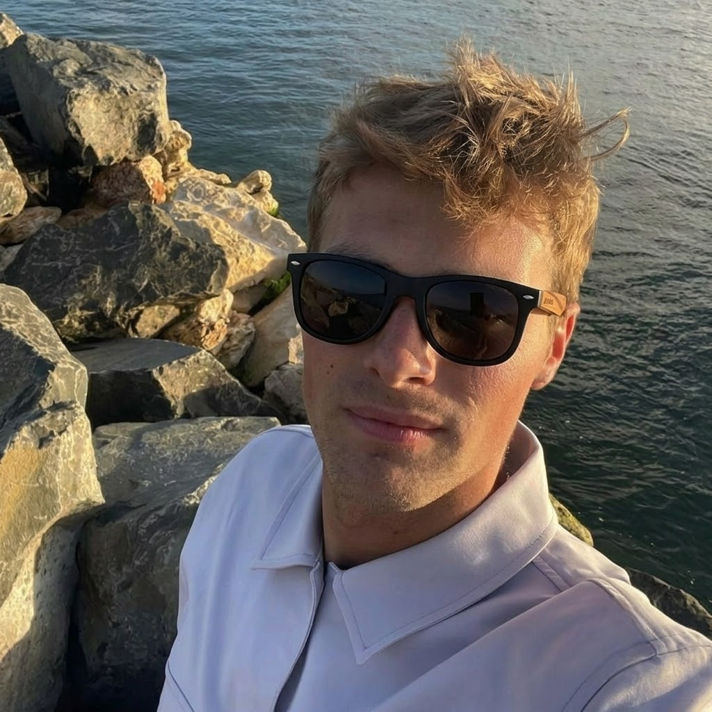 Wooden sunglasses on man with dark lenses and brown zebrawood temples
