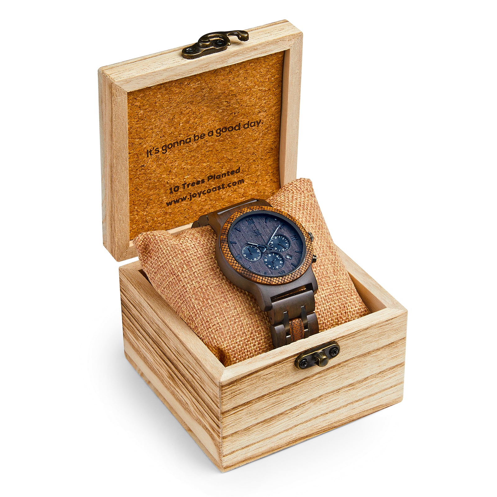 Dark sandalwood wooden watch with chronograph face displayed on cushion inside engraved wooden box