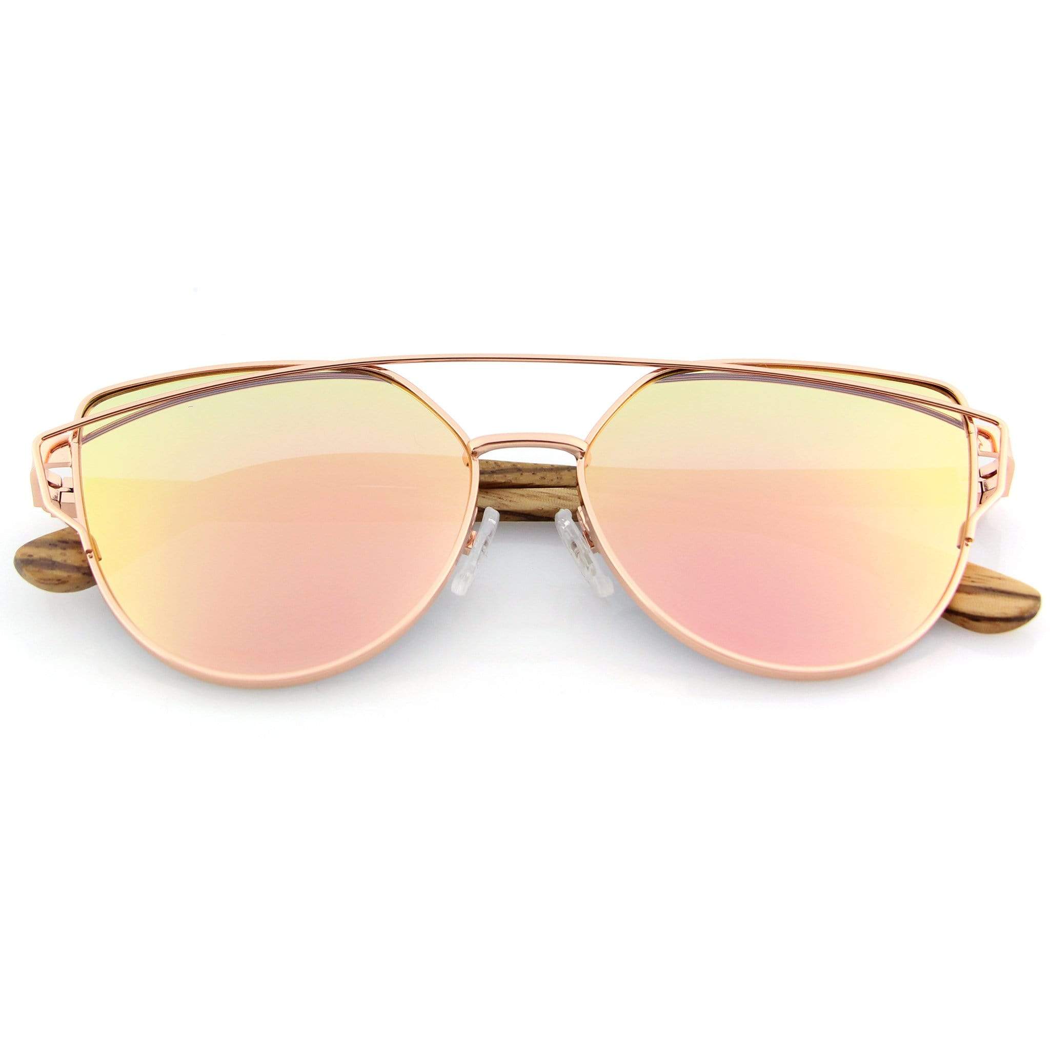 Cat eye sunglasses with gold frame and gradient pink lenses with wood temple tips