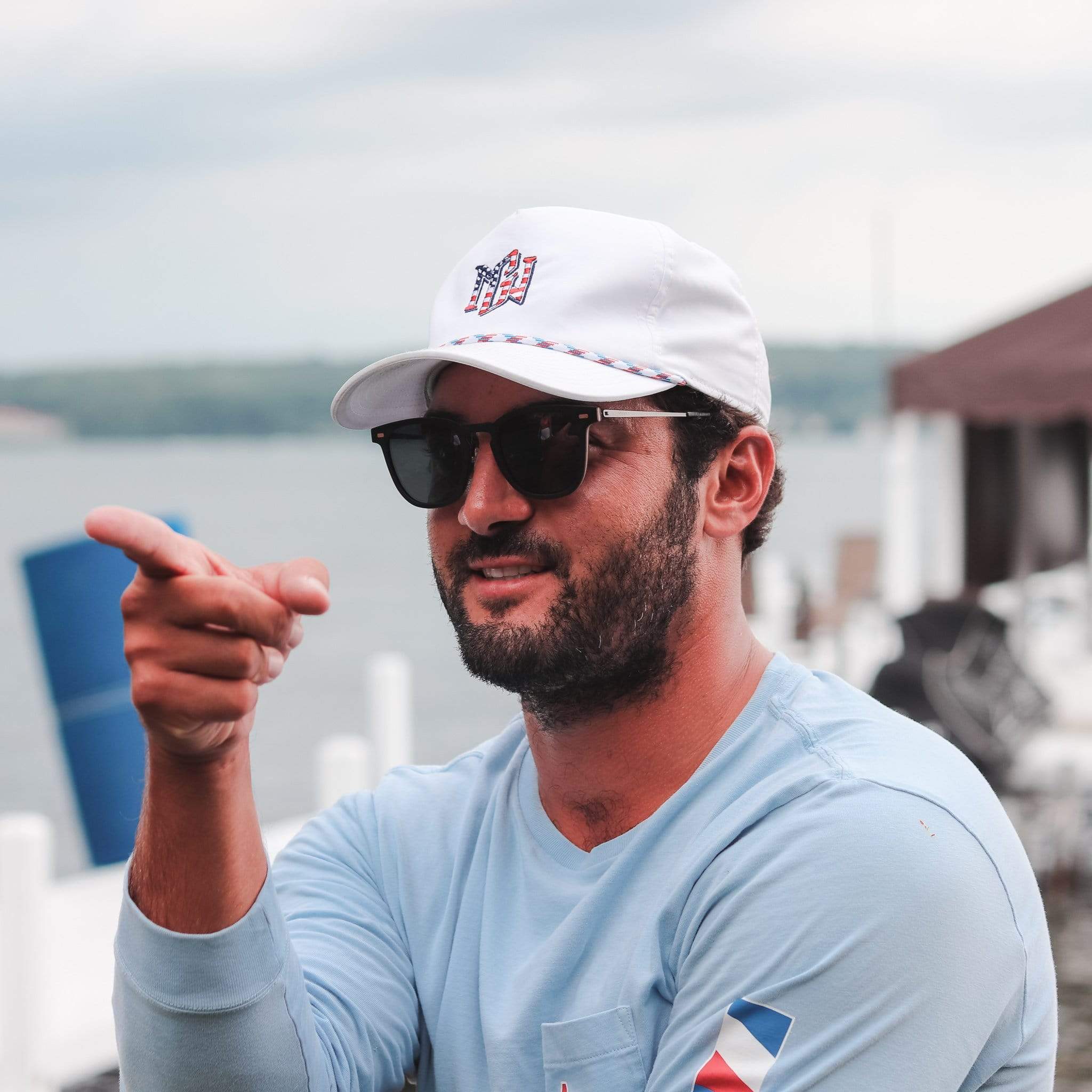 Sunglasses on man with dark frames and tinted dark lenses