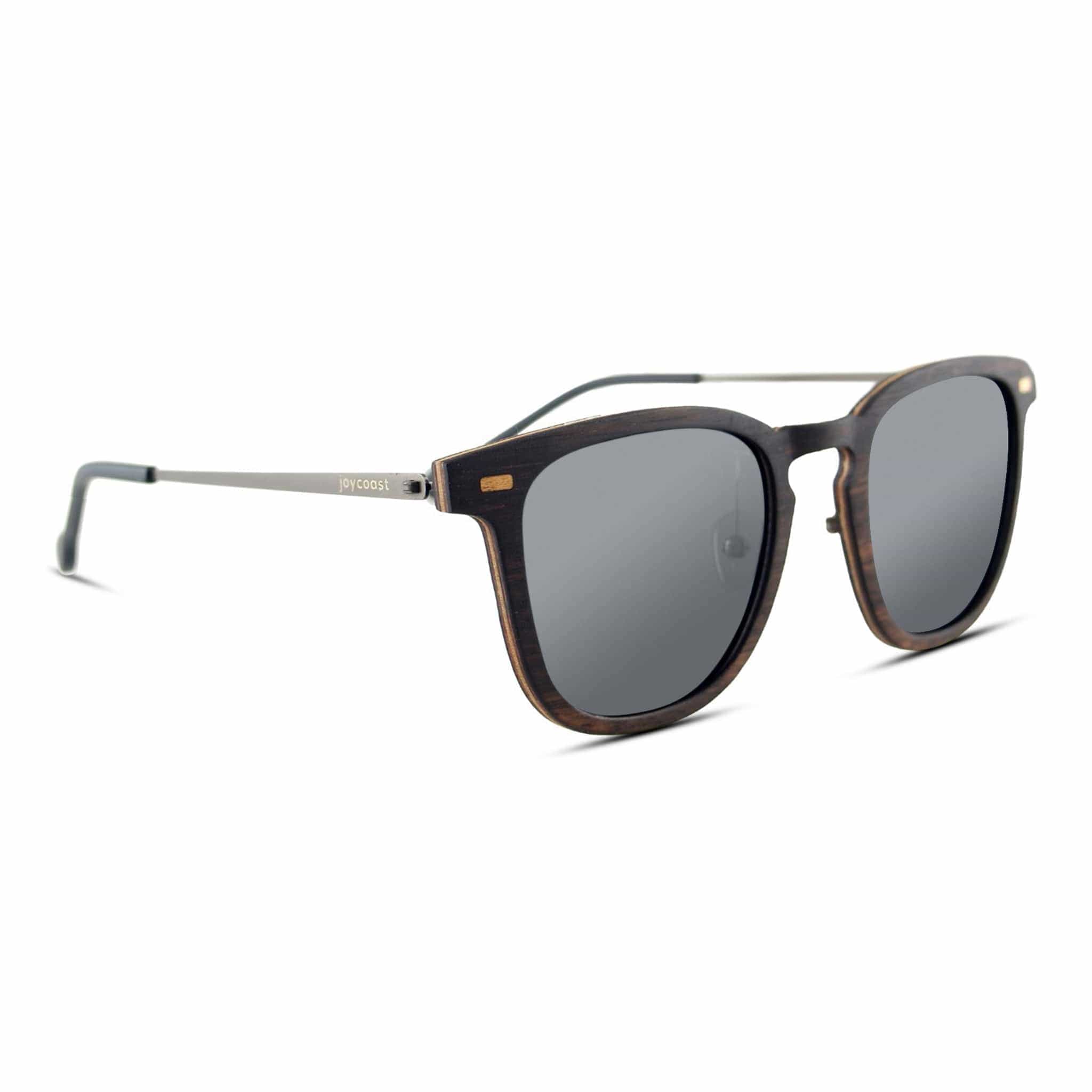 Sunglasses with gray lenses, dark frames, and metal temple arms