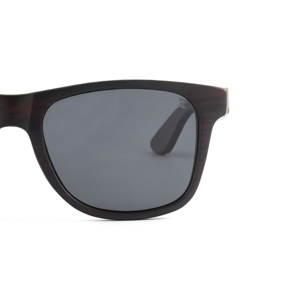 Half-frame view of brown wooden sunglasses with dark gray polarized lenses
