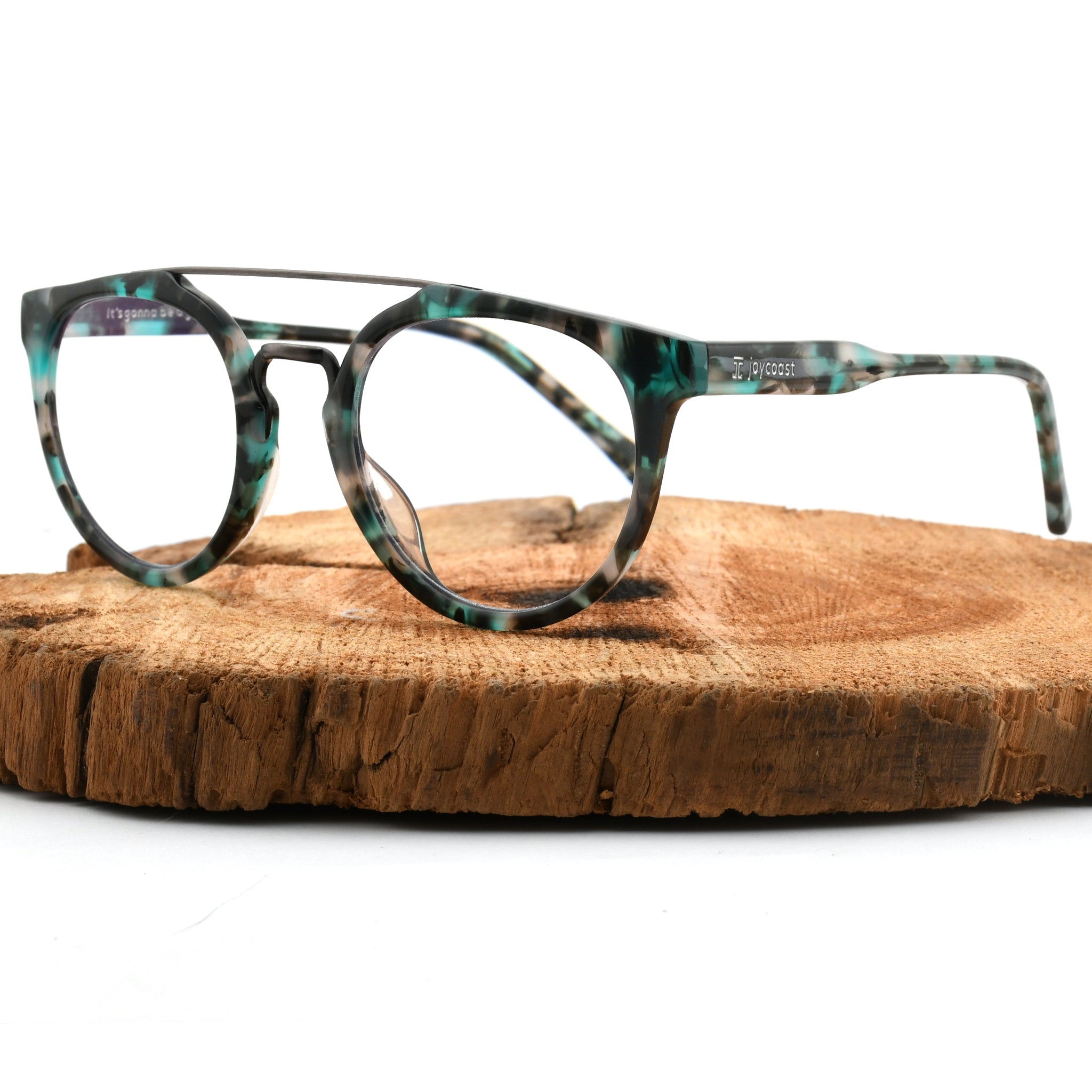 Round acetate reading glasses in teal and dark tortoise pattern frames