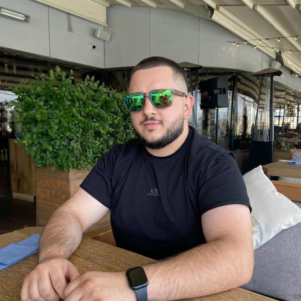 Transparent wood sunglasses on a man’s face with green mirrored lenses