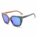Wood sunglasses with abalone-pattern frame and blue mirrored lenses