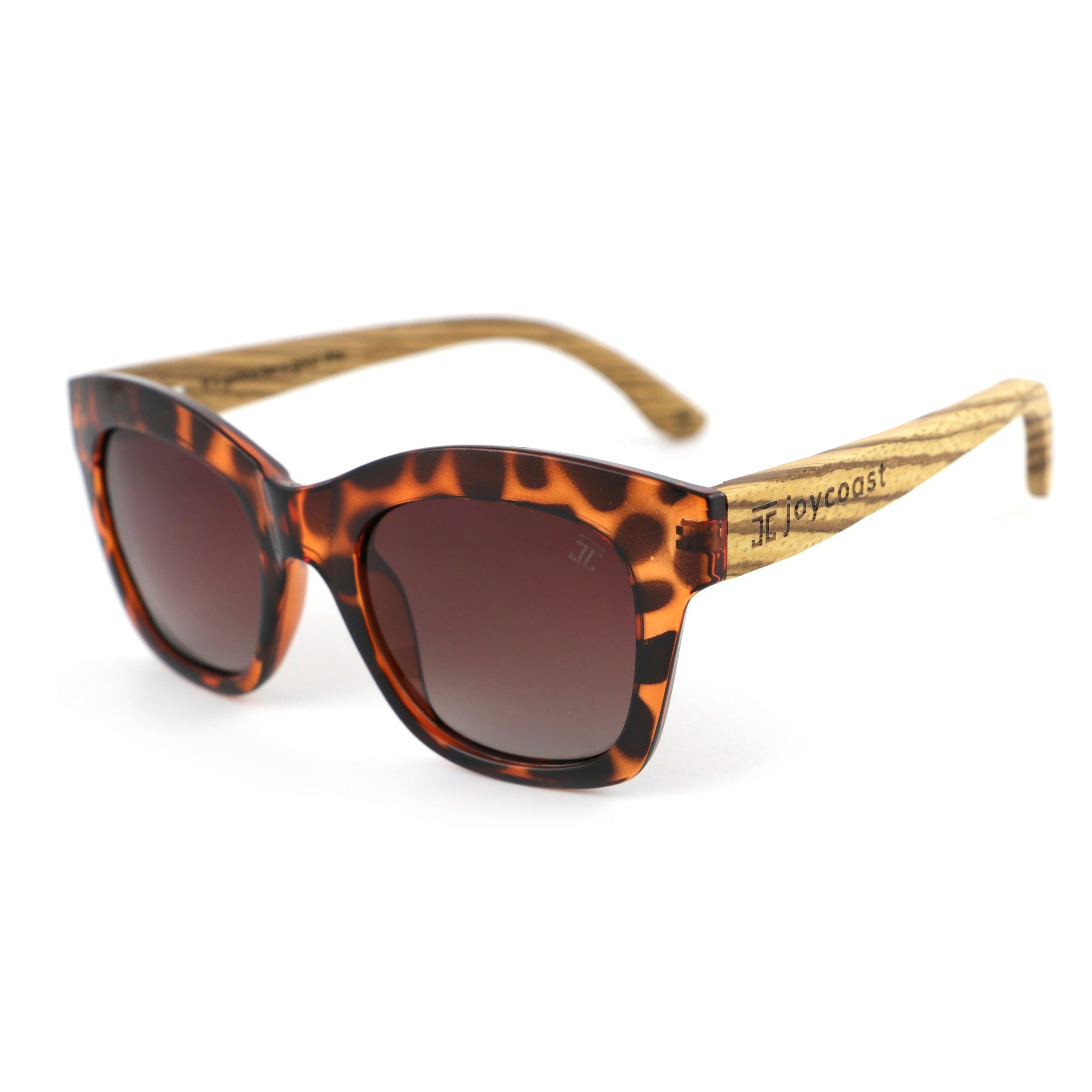 Oversized tortoise sunglasses with dark lenses and wood temple arms