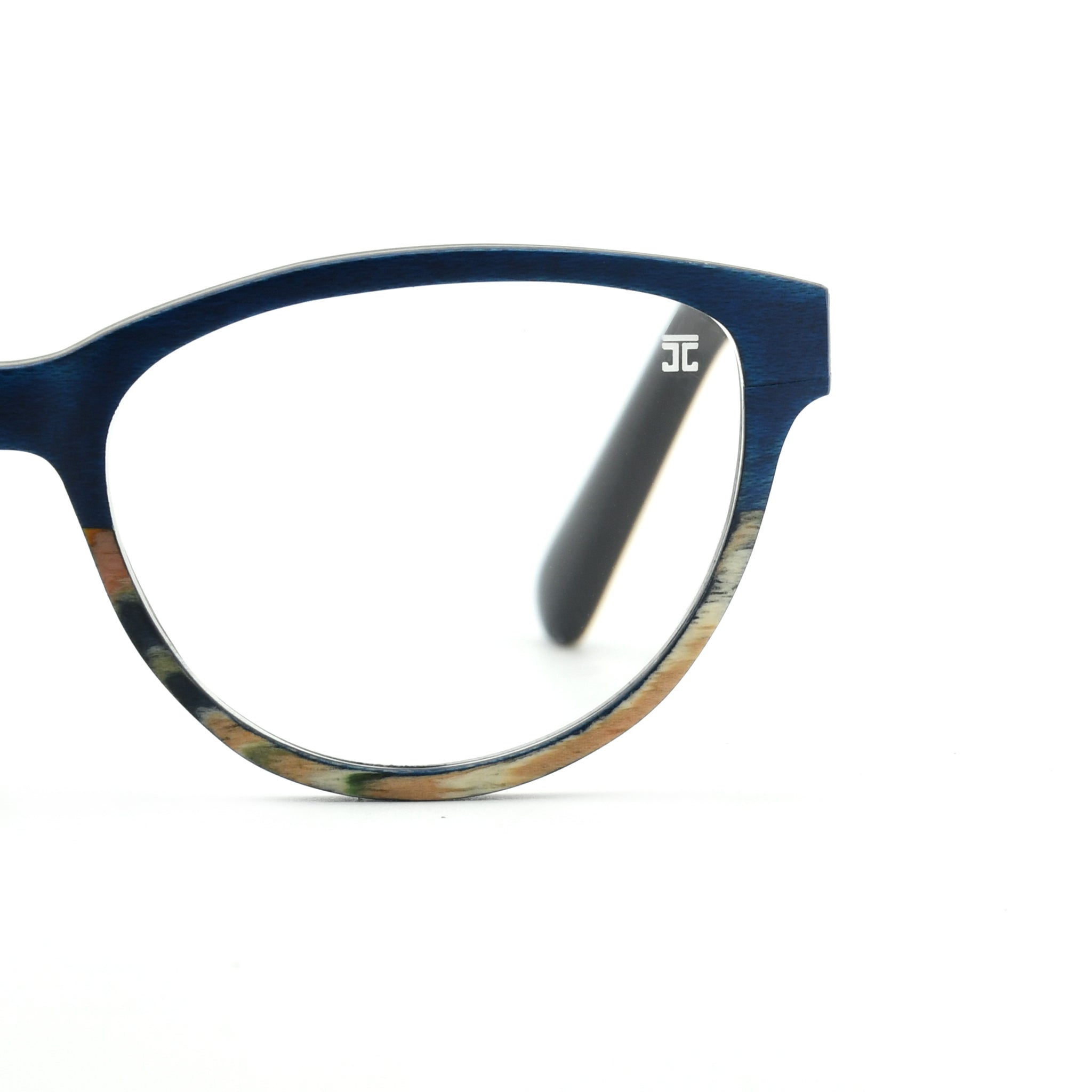Round cat-eye reading glasses with blue frame and dark inner nose bridge