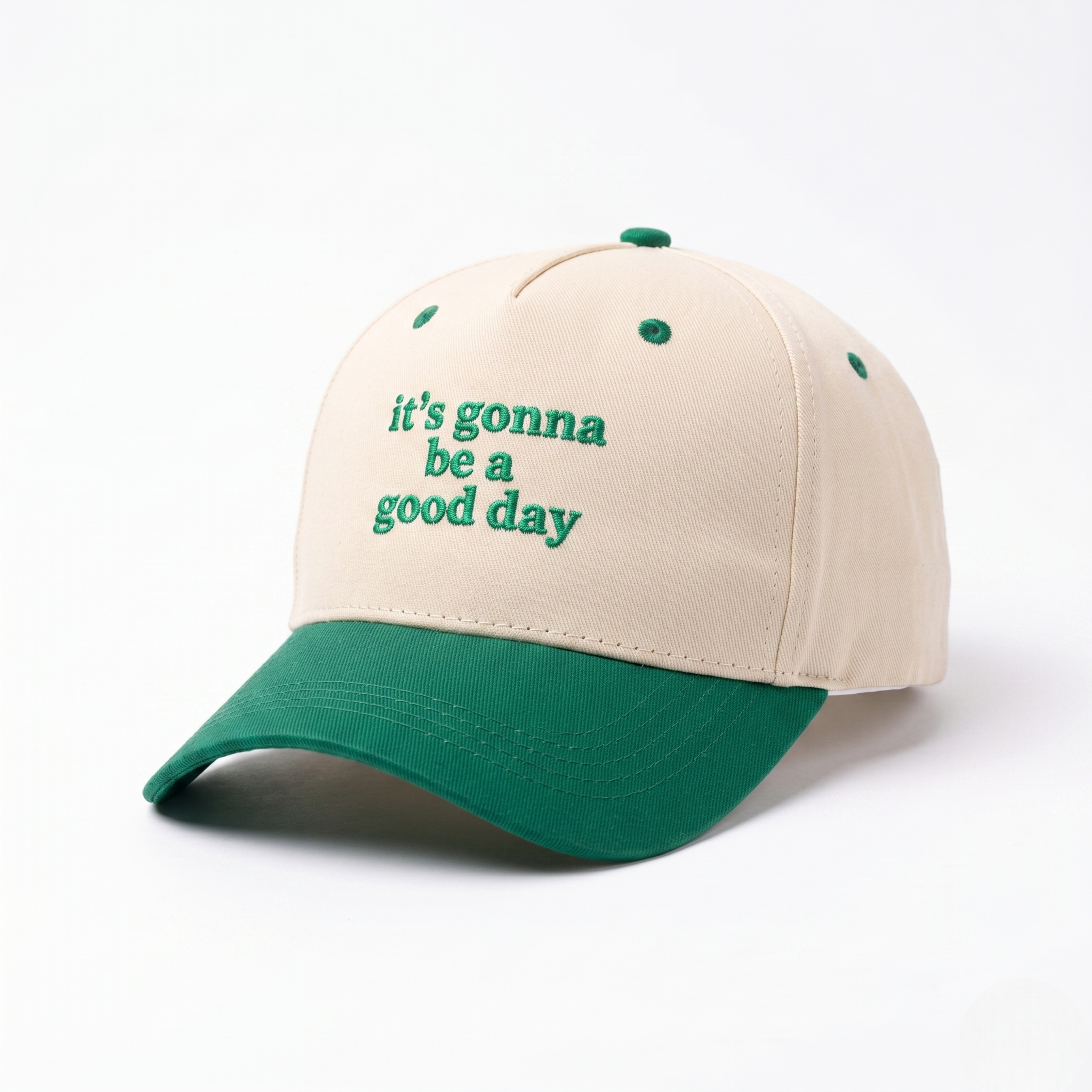 Cream and green baseball cap with “it’s gonna be a good day” front text