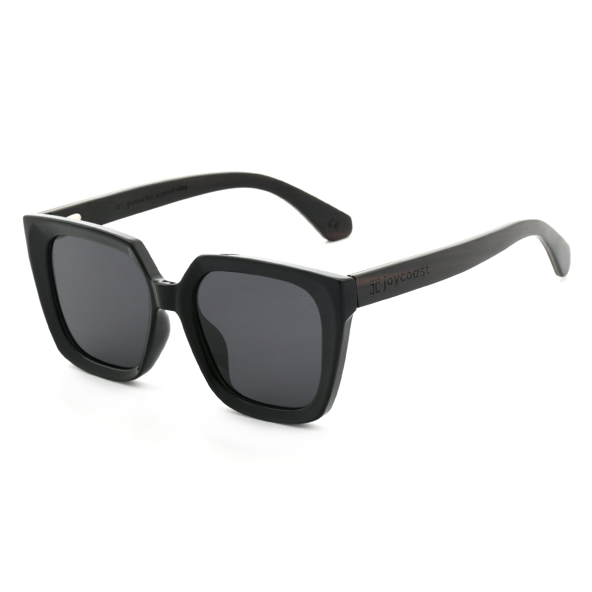 Black square sunglasses with dark lenses, viewed from the side on a white background.
