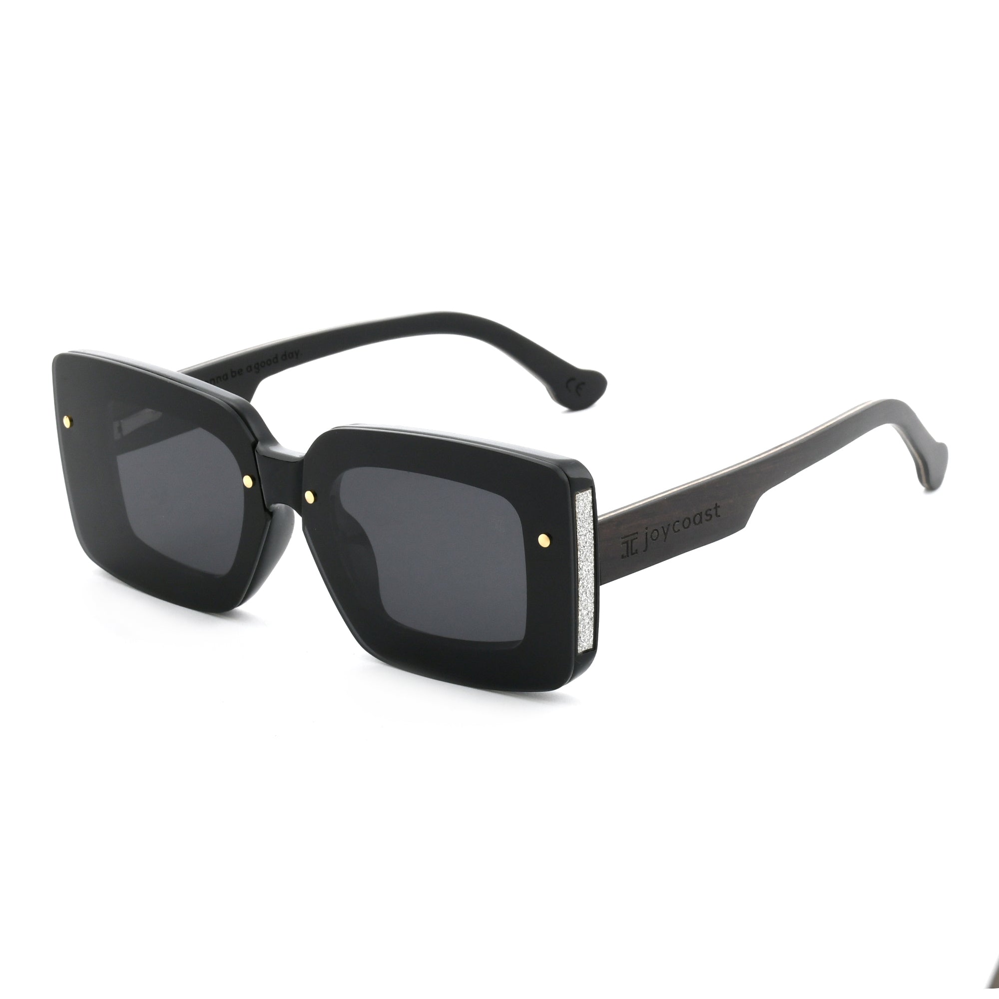 Joycoast black wooden square sunglasses with dark polarized lenses, viewed from an angle on a white background.