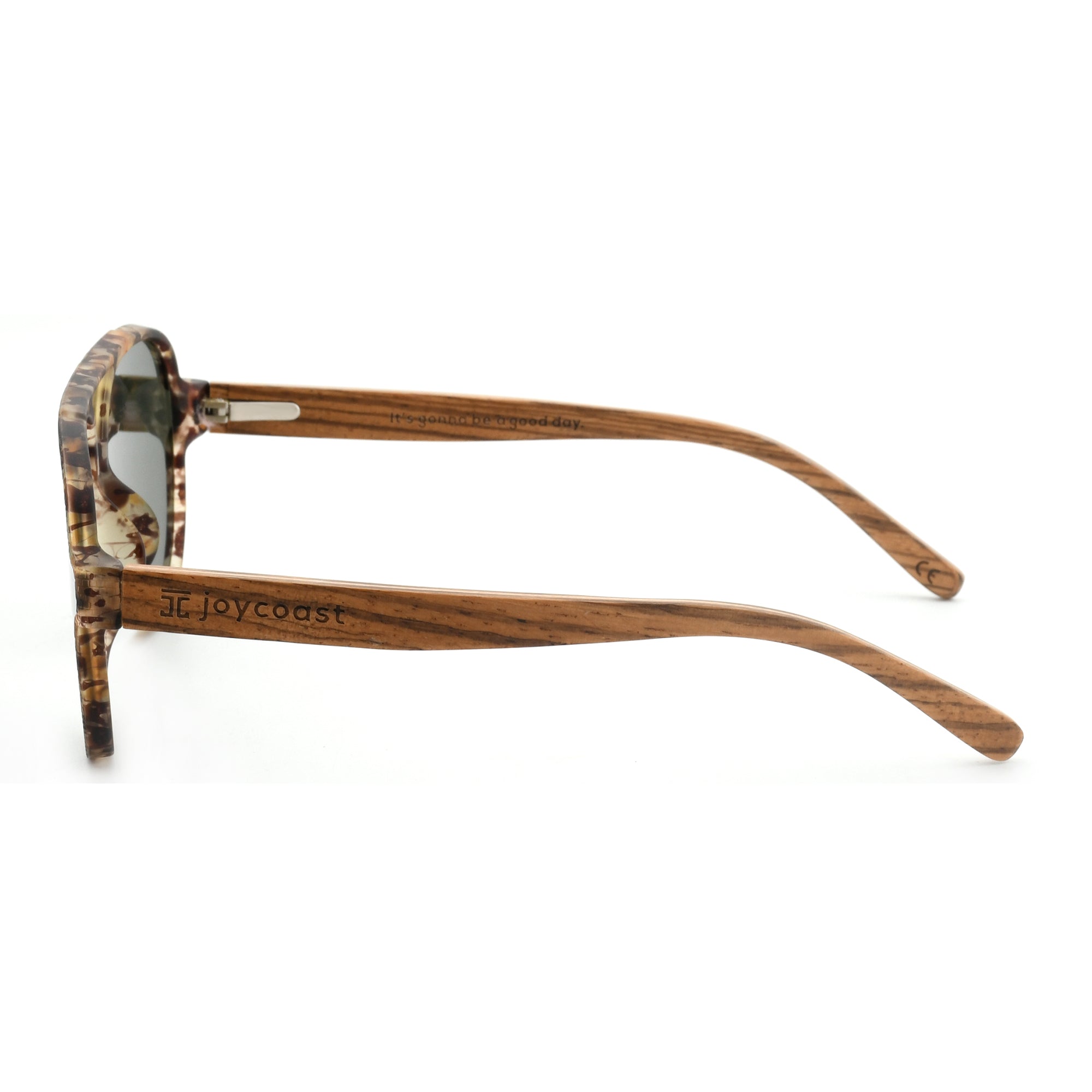 Joycoast tortoise shell wooden aviator sunglasses with dark green lenses and wooden temples, viewed from above on a white background.