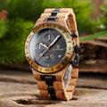 Zebrawood chronograph watch with dark dial, black subdials, wooden bracelet and bezel accents