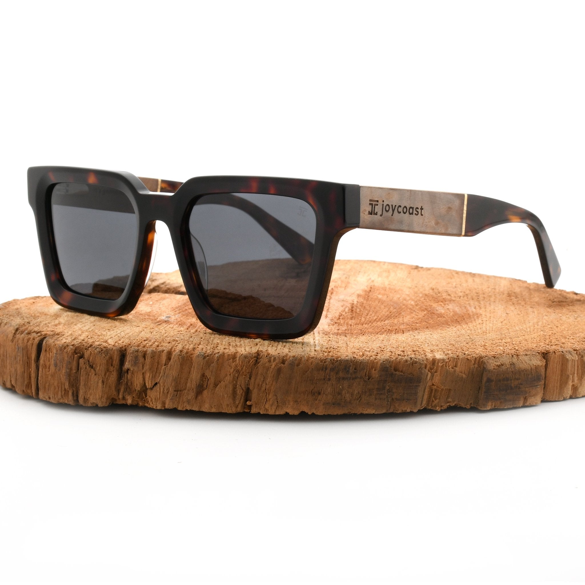 Square wooden sunglasses with dark lenses and tortoiseshell frames