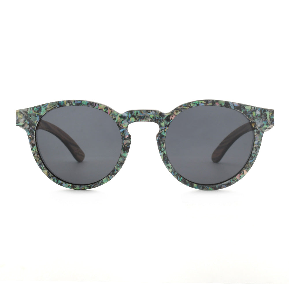 Round sunglasses with abalone-pattern frame, dark gray lenses, full front view.