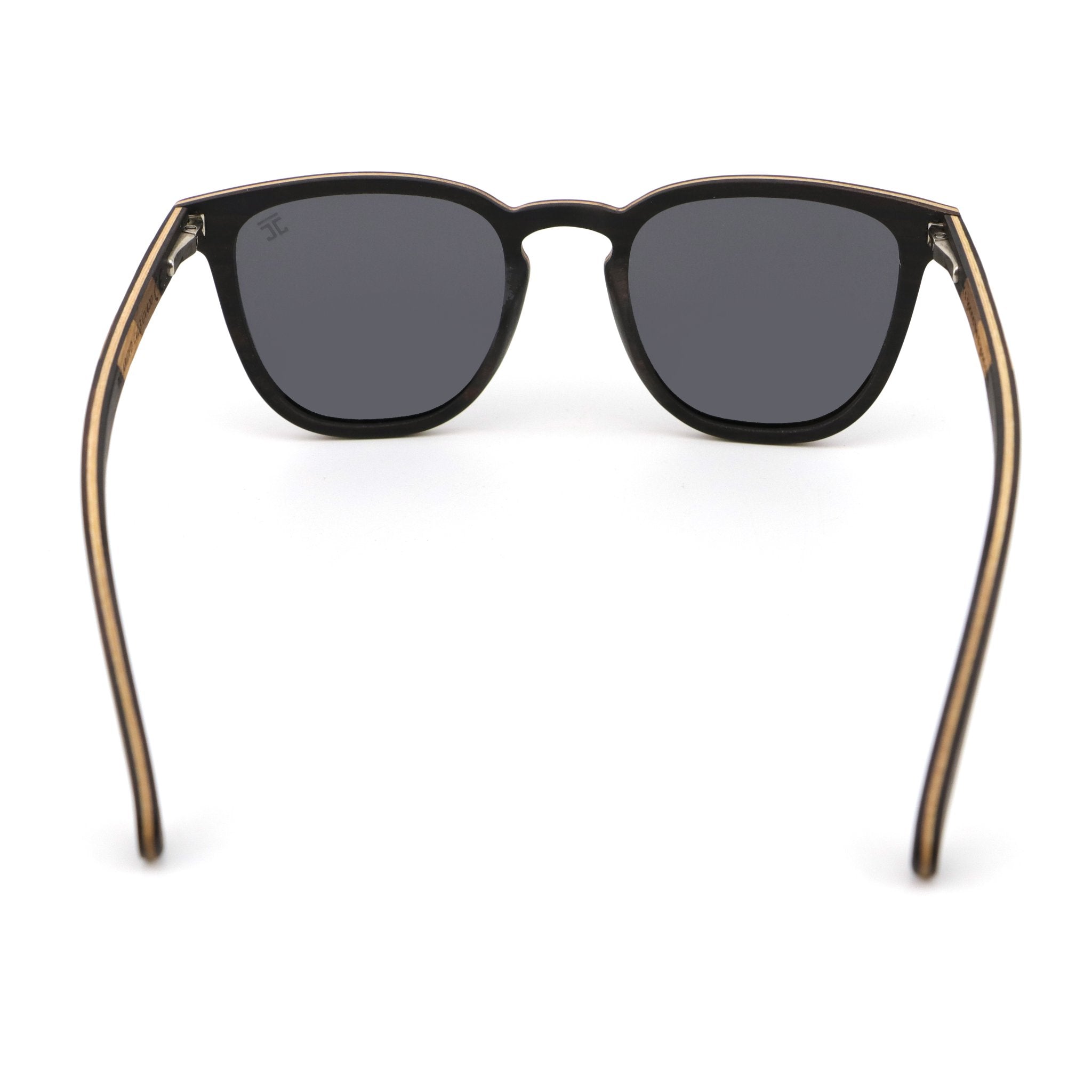 Front view sunglasses with dark lenses and wood-pattern temples