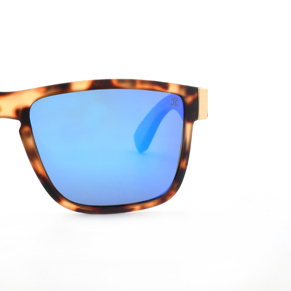 Tortoiseshell sunglasses with blue gradient lenses