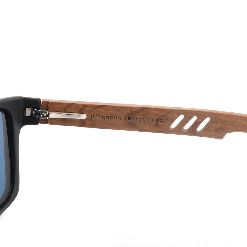 Sporty sunglasses temple detail: wood arm with black hinge and metal rivet