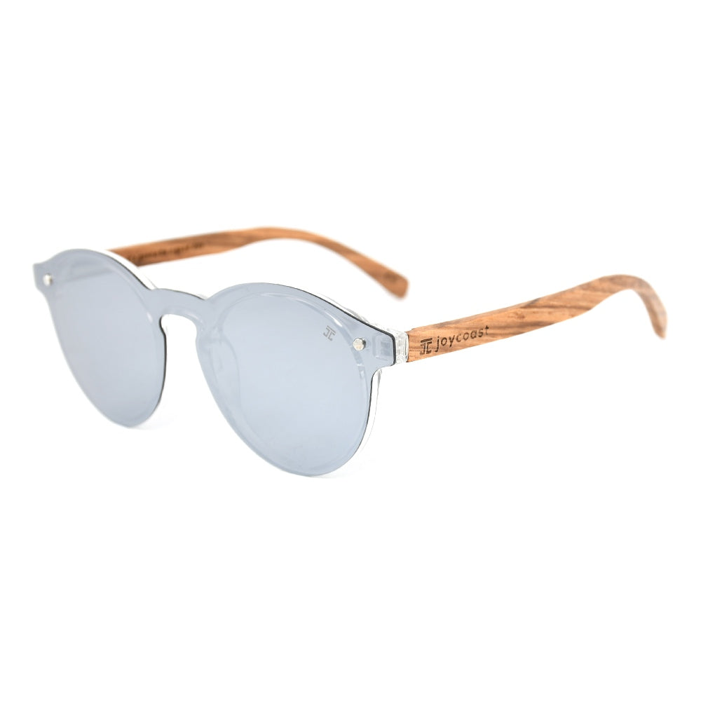 Winnie round sunglasses with light blue lenses and tan arms, silver frame