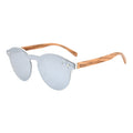Winnie round sunglasses with light blue lenses and tan arms, silver frame