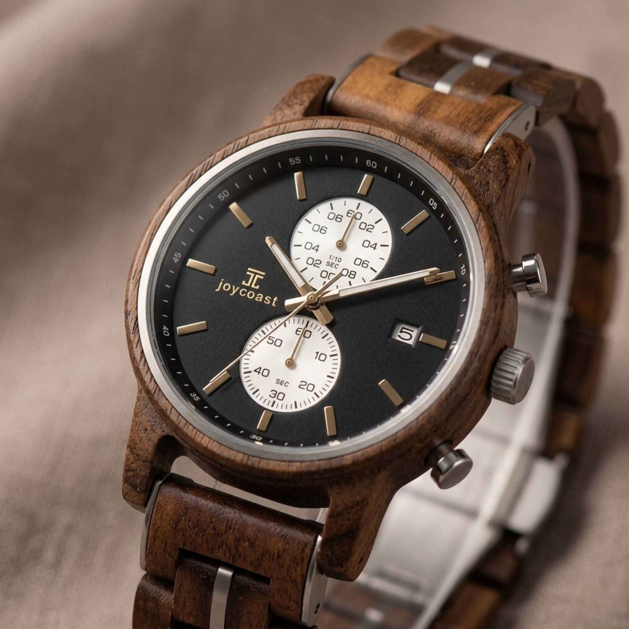 Walnut chronograph watch close-up with dark dial, three subdials, side pushers