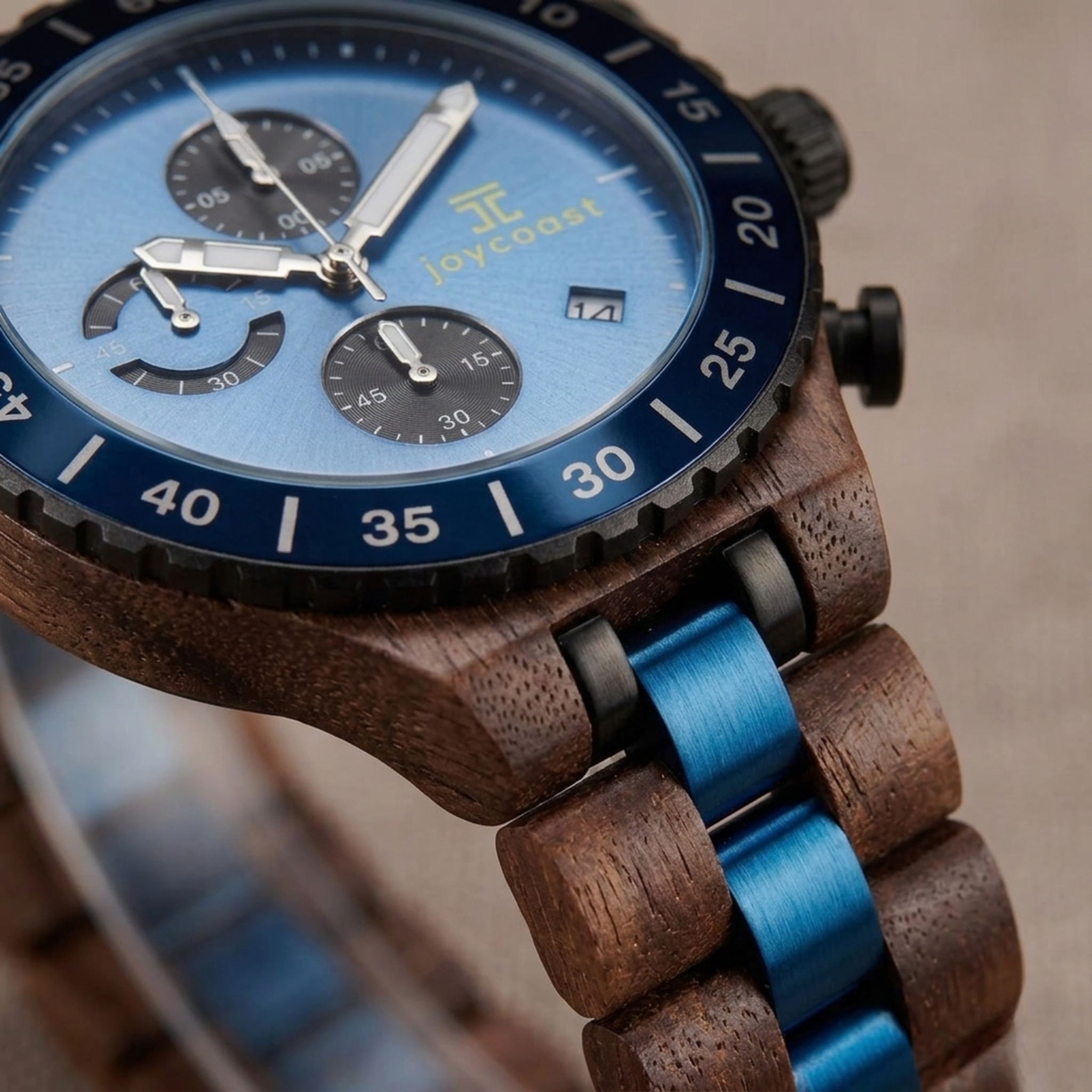 Zebrawood chronograph watch close-up with blue dial and subdials