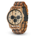 Zebrawood chronograph watch with round dial, black subdials, and wood link bracelet