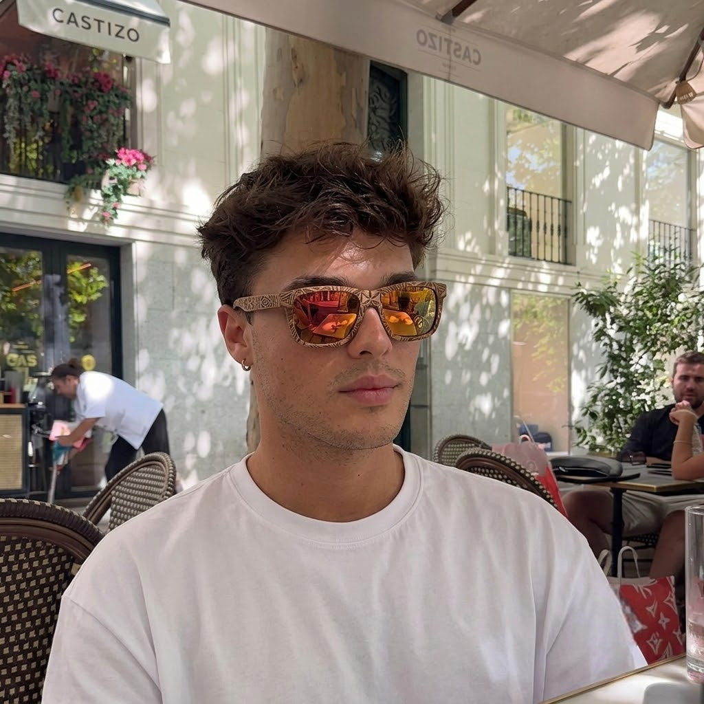 Wooden sunglasses with orange mirrored lenses and dark patterned frame