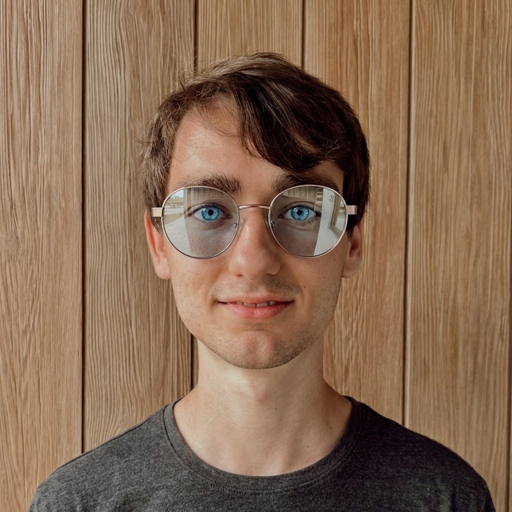 Kids metal sunglasses with round silver frames and blue-tinted lenses