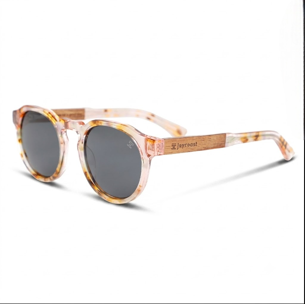 Kids wooden sunglasses, angled view; tortoise round frames with dark lenses