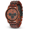 Red wood chronograph watch with patterned dial and black subdials, wooden link band