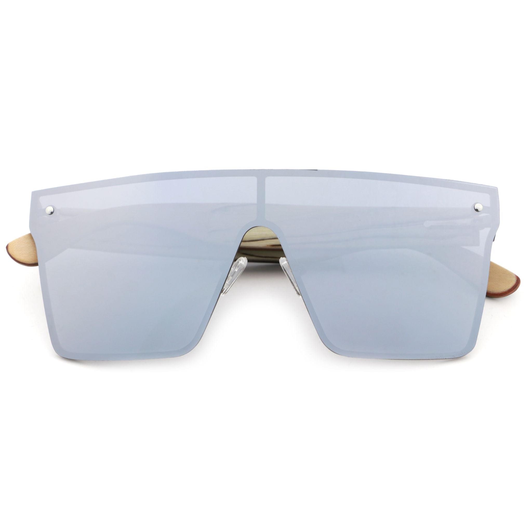 Apres-ski frameless sunglasses with light gray frame and pale blue lenses, wood arms