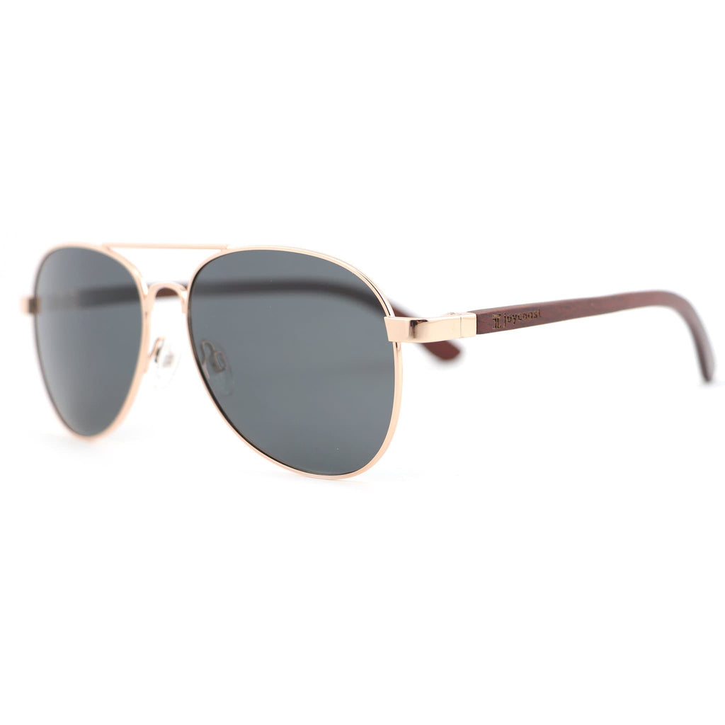 Aviator sunglasses with rose gold frames and dark gray lenses, side view