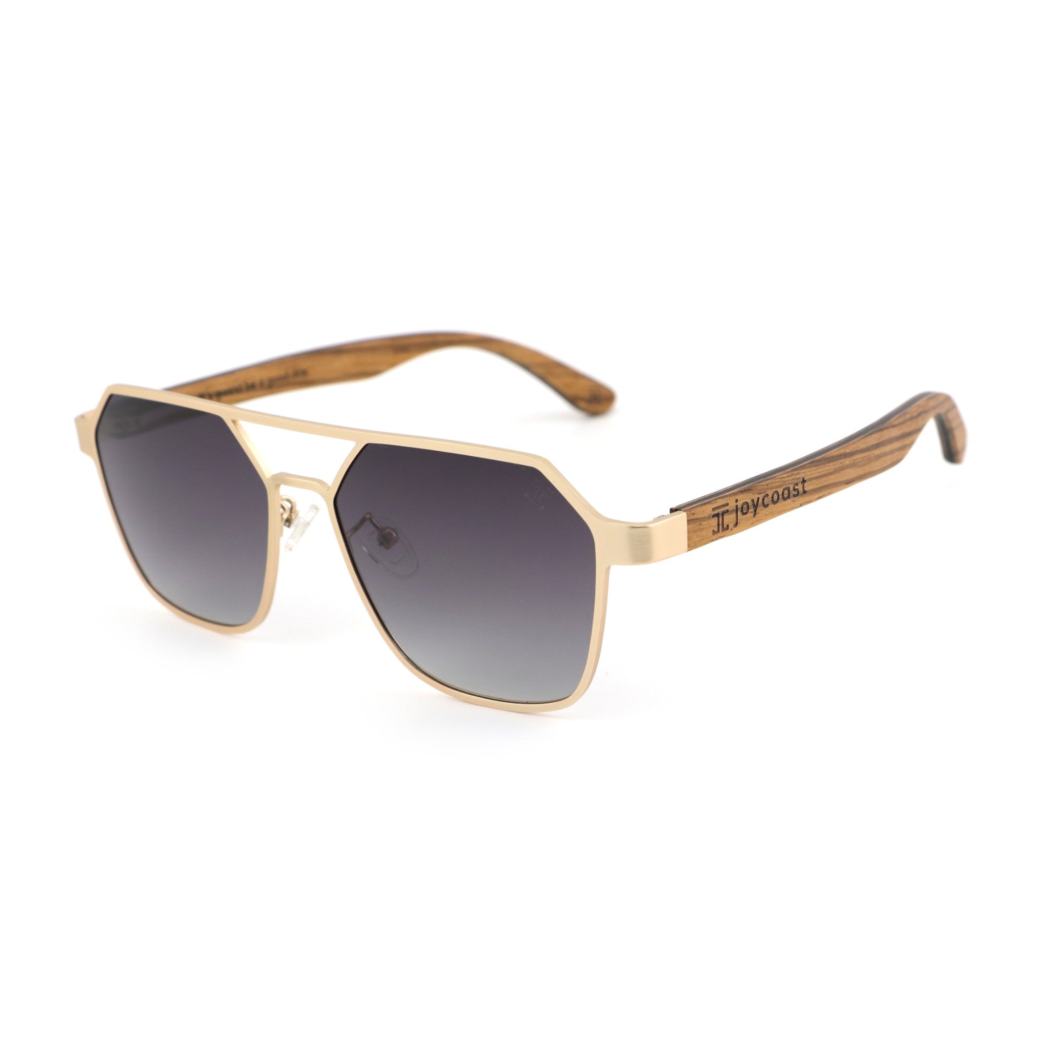 Hexagon wooden sunglasses with dark polarized lenses, gold frame, Joycoast logo on temple.