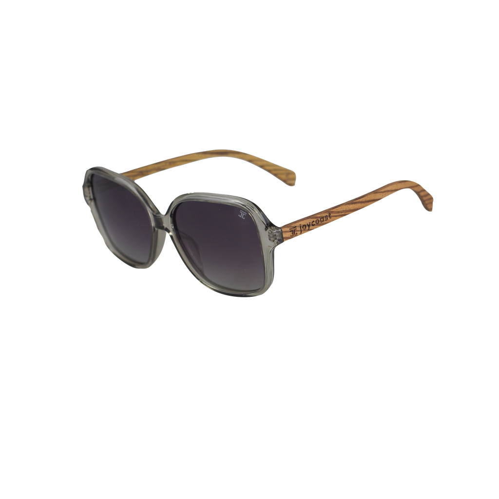 Cat-eye sunglasses angled view, dark lenses, brown wood-look temples