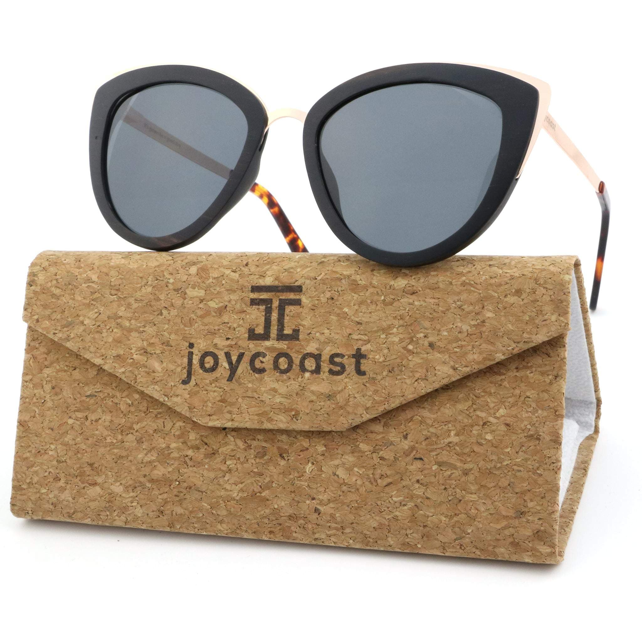 Cat-eye sunglasses with black frames and dark lenses, with cork carrying case