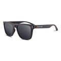 Ebony sunglasses with dark lenses and wood-look arms, square angular frame